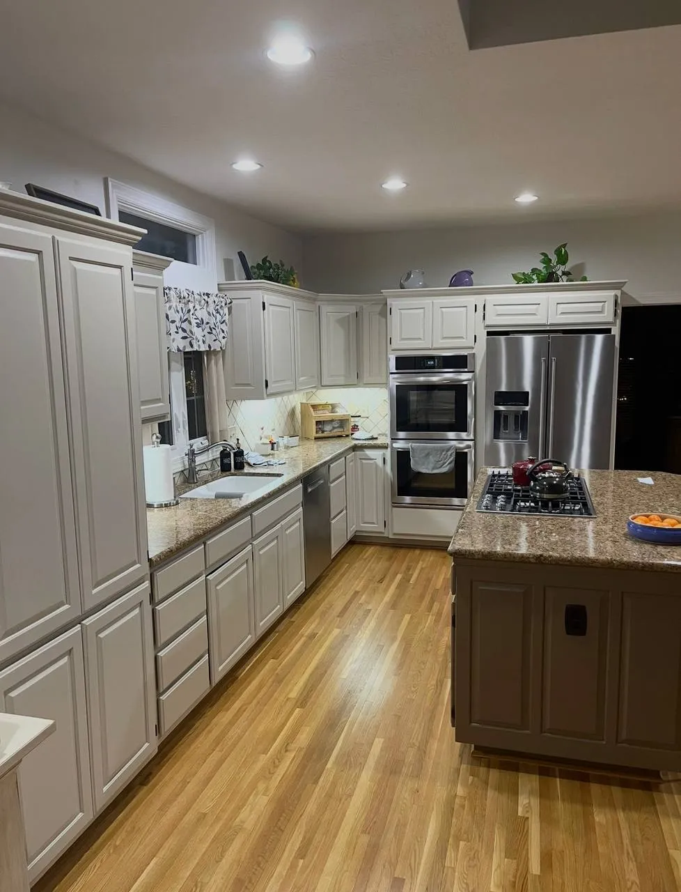 The same kitchen cabinets refinished in greige