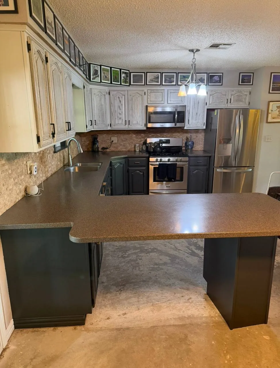 The same kitchen island refinished in gray