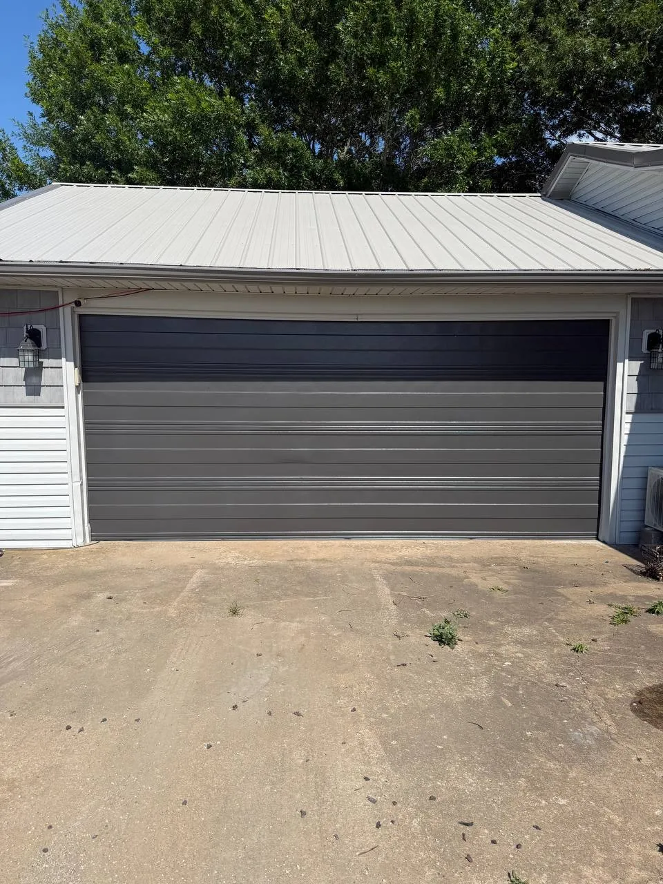 The same garage door freshly repainted