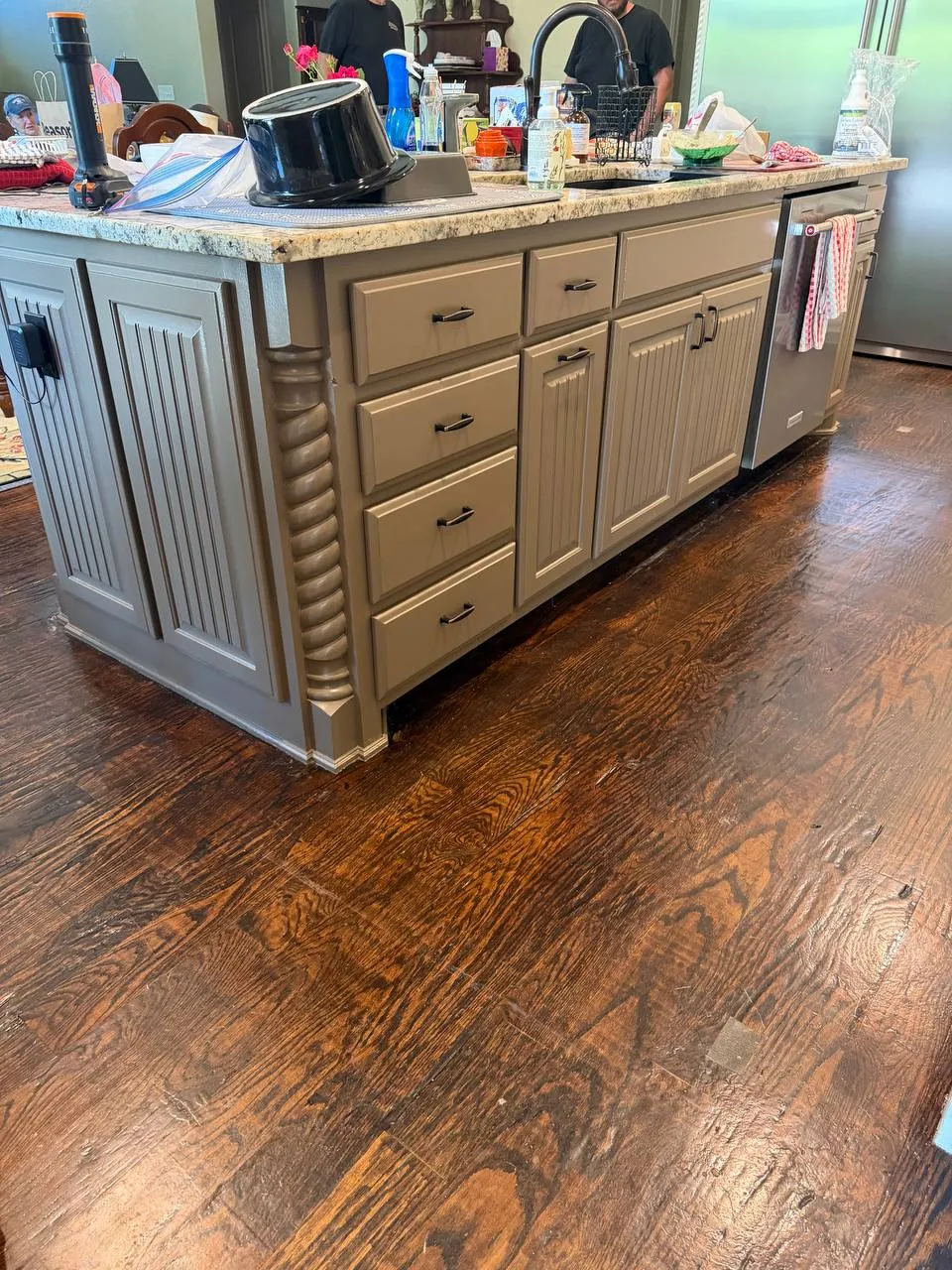 The same kitchen cabinets refinished in gray