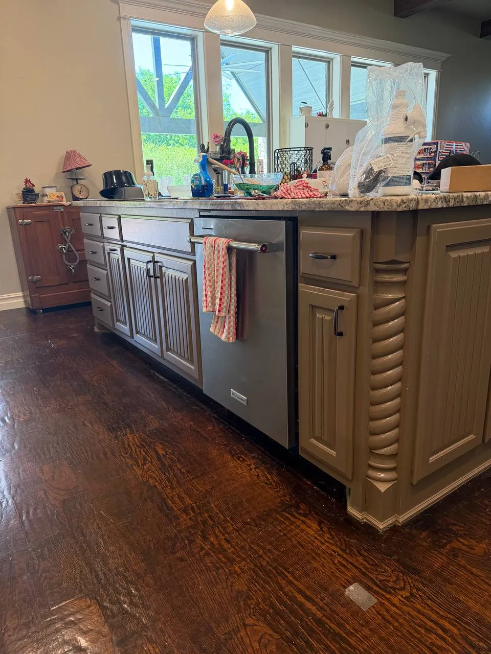 The same kitchen island refinished in a warm neutral