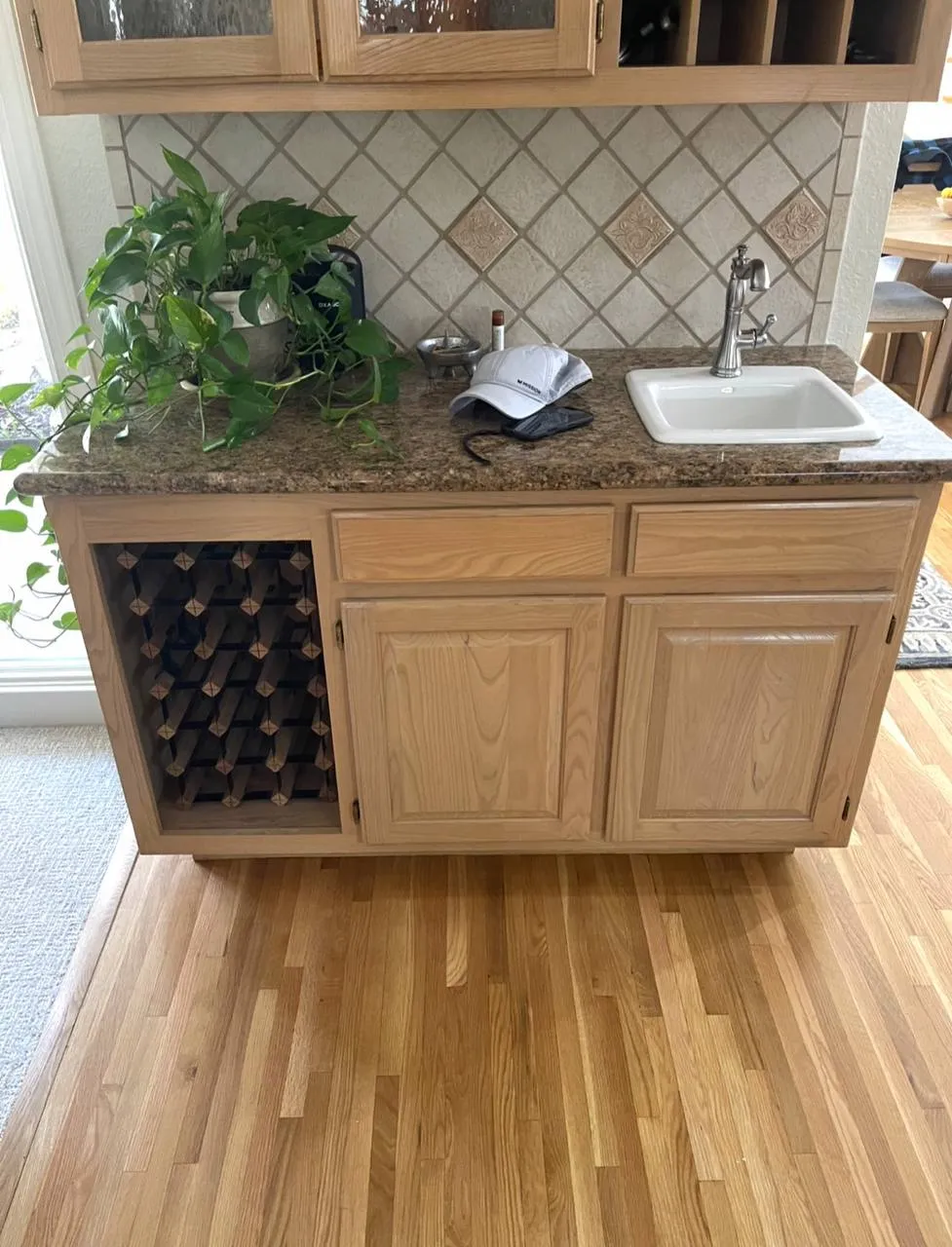 Natural oak wet bar cabinets before refinishing